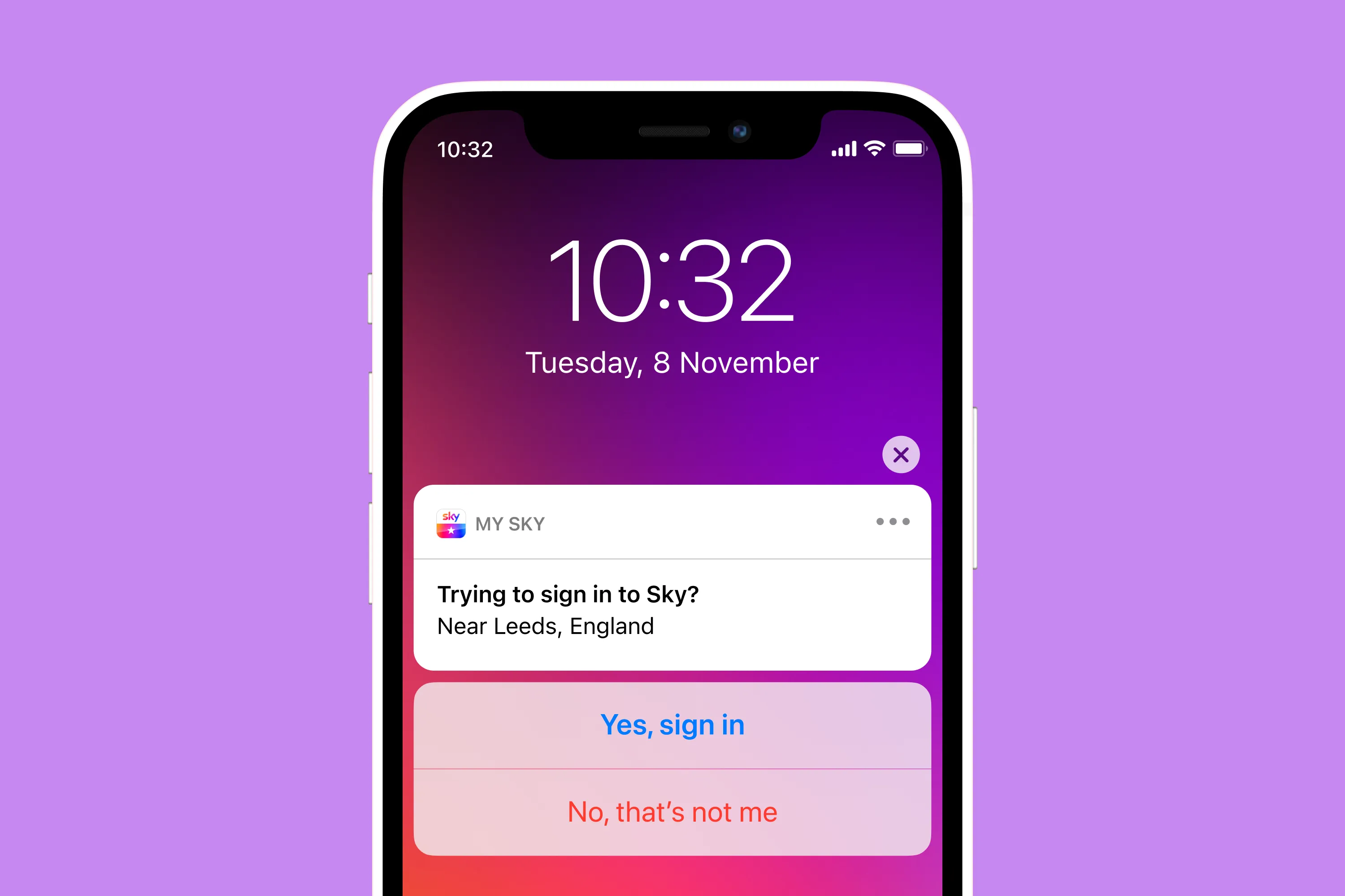 Close-up of iPhone lock screen displaying a My Sky notification asking to confirm a sign-in attempt near Leeds, England.