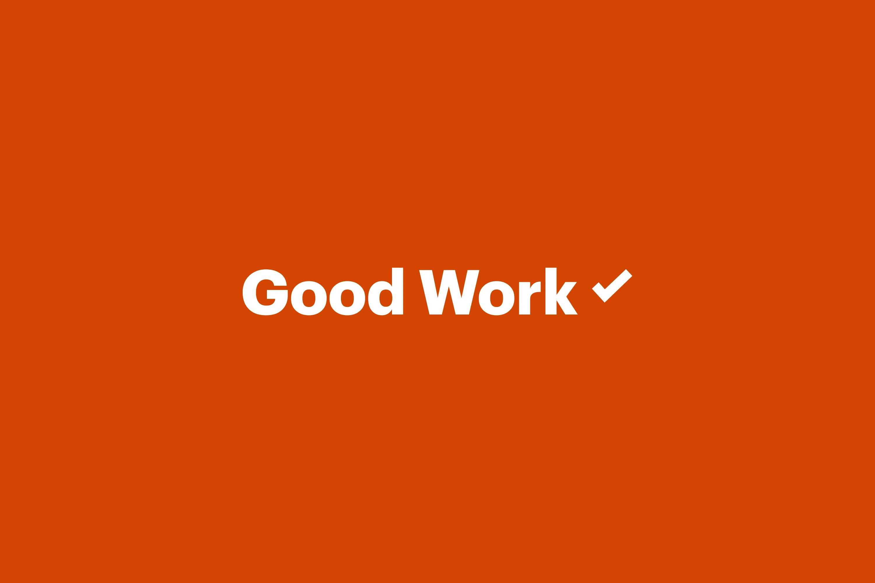 Good Work logo. Bold white “Good Work” text with a checkmark on a solid orange background.